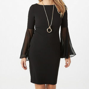 Long sleeve black dress with flutter sleeves
